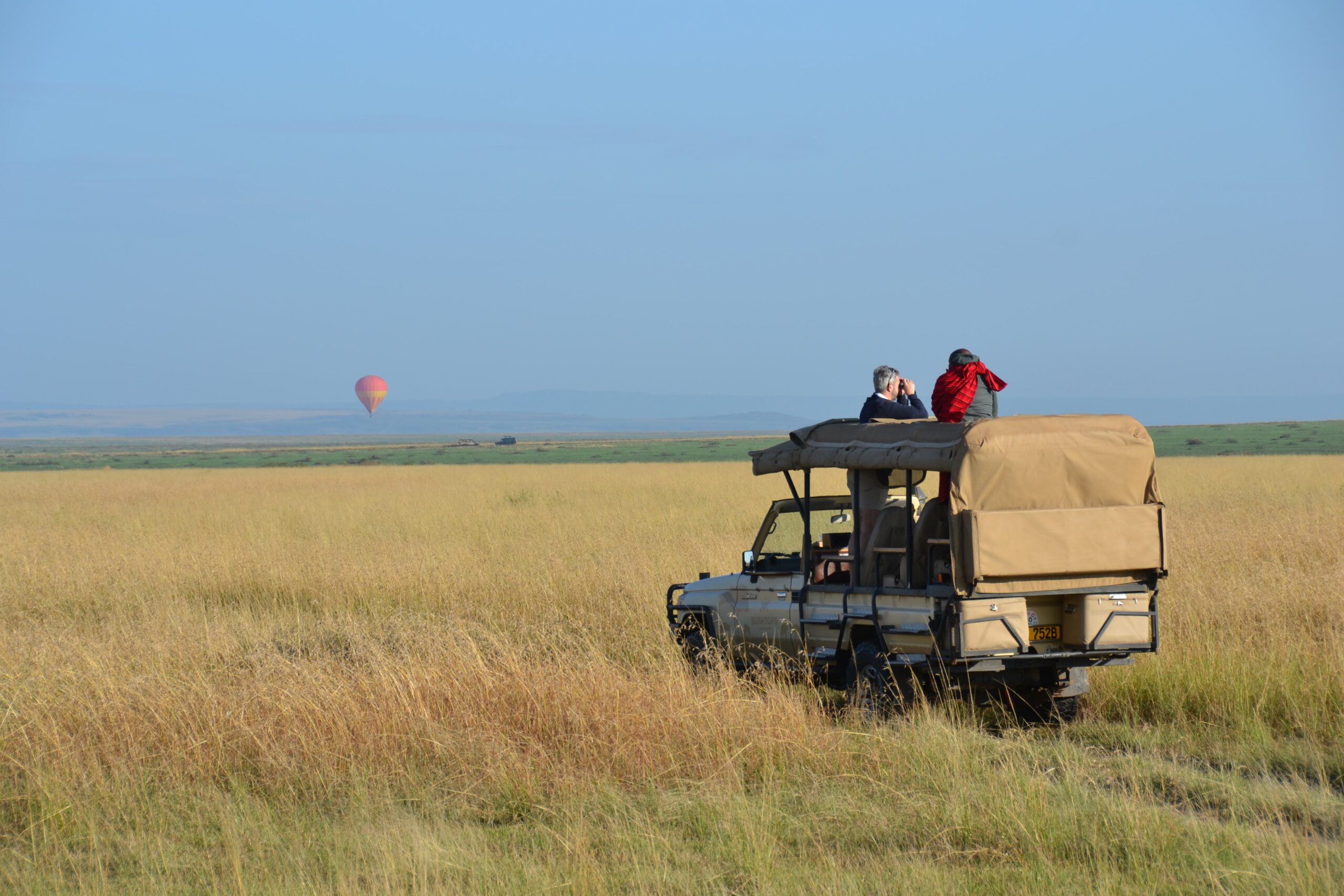 Tourists observing free-ranging elephants in Amboseli National Park Kenya